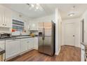 Kitchen with stainless steel appliances and hardwood floors at 1356 Tranquility Ln., Myrtle Beach, SC 29577