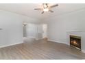 Living room with fireplace and wood-look flooring at 500 Willow Greens Dr. # B, Conway, SC 29526