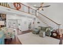 Open living space with high ceilings and lofted area at 1725 26Th Ave N, North Myrtle Beach, SC 29582