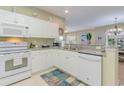 Well-equipped kitchen with white cabinets and granite countertops at 601 Hillside Dr. N # 3906, North Myrtle Beach, SC 29582
