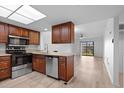 Open kitchen with stainless steel appliances and island at 1301 Pridgen Rd. # 1008, Myrtle Beach, SC 29577