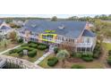 Unit 15F: Two-story condo with balcony, landscaped grounds, and waterfront access at 4755 Lightkeepers Way # 15-F, Little River, SC 29566