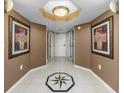 Bright entryway with tile floor and artwork at 2151 Bridgeview Ct. # 3-303, North Myrtle Beach, SC 29582