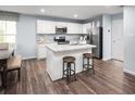 Modern kitchen with white cabinets, granite countertops, and island at 1092 Oak Meadow Dr., Conway, SC 29526