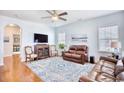 Spacious living room with hardwood floors and leather sofas at 911 Ocean Pines Ct., North Myrtle Beach, SC 29582