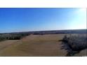 Aerial view of farmland with a railroad track at 6248 Ellwood Rd., Galivants Ferry, SC 29544
