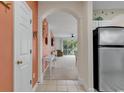 Bright entryway with tile flooring, leading to living room and kitchen at 5801 Oyster Catcher Dr. # 1923, North Myrtle Beach, SC 29582