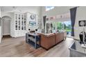Spacious living room with high ceilings, fireplace and built-in shelving at 423 Chamberlain Rd., Myrtle Beach, SC 29588
