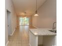 Open kitchen with granite countertops and breakfast bar at 3681 Claypond Rd. # 3107, Myrtle Beach, SC 29579