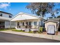Single story home with front porch at 6001 - 5238 S Kings Hwy., Myrtle Beach, SC 29575