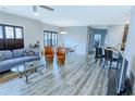 Spacious living room with hardwood floors and open layout at 949 Jackline Place # 103, Murrells Inlet, SC 29576