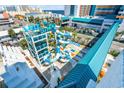 Large waterpark with slides and pool area at 1501 Ocean Blvd. S # 839, Myrtle Beach, SC 29577