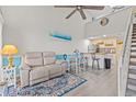 Open living space with kitchen and loft views at 1100 Possum Trot Rd. # H-355, North Myrtle Beach, SC 29582