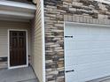 House exterior showcasing a side entrance and garage at 428 Hallie Martin Rd., Conway, SC 29527