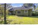 House with green exterior and landscaping at 4605 Hickory Holt Rd., Galivants Ferry, SC 29544
