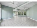 Bright sunroom with tile floors and access to backyard at 4605 Hickory Holt Rd., Galivants Ferry, SC 29544