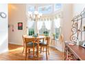Bright breakfast nook with a round table and built in shelving at 4839 Seabreeze Ln., Myrtle Beach, SC 29579