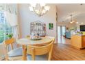 Kitchen features a round table for four and a view into the living room at 4839 Seabreeze Ln., Myrtle Beach, SC 29579