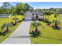 Beautiful home with a long driveway and lush landscaping at 3712 Faith Dr., Conway, SC 29527