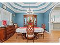 Bright dining room featuring a wood table and hutch at 3712 Faith Dr., Conway, SC 29527