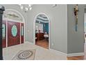 Elegant entryway with tile flooring and stained glass accents at 3712 Faith Dr., Conway, SC 29527