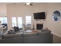 Spacious living room with fireplace and built-ins at 2013 Great Blue Heron Dr., Little River, SC 29566
