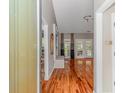 Bright entryway with hardwood floors, leading to living room and other areas at 1474 Riceland Ct., Murrells Inlet, SC 29576