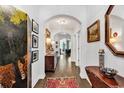 Bright and spacious entryway with hardwood floors, elegant furniture, and beautiful artwork at 3722 White Wing Circle, Myrtle Beach, SC 29579