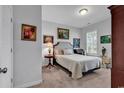 Cozy bedroom featuring a comfortable bed, a nightstand, and plenty of natural light at 3722 White Wing Circle, Myrtle Beach, SC 29579