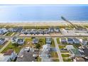Aerial view of beach house with water access at 108 Burlington St. W, Holden Beach, NC 28462