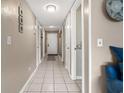 Light-filled hallway with tile floors and wall decor at 5905 South Kings Hwy. # A246, Myrtle Beach, SC 29575