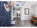 Bright entryway with hardwood floors and a view into the living area at 160 Freeboard Ln. # 802, Carolina Shores, NC 28467