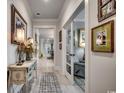 Bright hallway with decorative console table and rug at 5849 Cremona Dr., Myrtle Beach, SC 29577