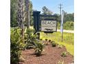 Beach Gardens community entrance sign with landscaping at 320 Palmetto Sand Loop, Conway, SC 29527