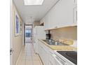 Condo kitchen with granite countertop and ocean view at 6900 N Ocean Blvd. N # 1238, Myrtle Beach, SC 29572