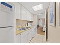 Small condo kitchen with granite countertop at 6900 N Ocean Blvd. N # 1238, Myrtle Beach, SC 29572