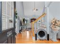 Bright entryway with hardwood floors and staircase at 505 Quincy Hall Dr., Myrtle Beach, SC 29579