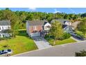 Two-story brick home with attached garage, driveway, and landscaped yard at 2248 Beauclair Ct., Myrtle Beach, SC 29579