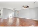 Bright living room featuring hardwood floors and ceiling fans at 2248 Beauclair Ct., Myrtle Beach, SC 29579
