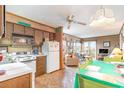 Open kitchen with views into living and dining areas at 1582 S Waccamaw Dr. # 60, Garden City Beach, SC 29576