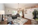 Spacious living room with hardwood floors and comfortable seating at 378 Oak Crest Circle, Longs, SC 29568