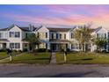 Two story townhome with welcoming front porch and landscaping at 893 Barn Owl Ct. # 893, Myrtle Beach, SC 29579