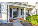 Welcoming front entrance with seasonal decor and landscaping at 893 Barn Owl Ct. # 893, Myrtle Beach, SC 29579