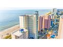 Aerial view of high rise building and beach at 2504 N Ocean Blvd. # 1736, Myrtle Beach, SC 29577