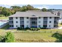 Two-story building exterior with pool in background at 4103 Pinehurst Circle # Bb-3, Little River, SC 29566