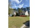 Attractive house with landscaping, two-car garage, and palm tree at 621 Elgin Ct., Myrtle Beach, SC 29579