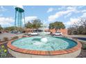 Quaint town square with a water fountain, local businesses, and ample parking at 322 Barn Owl Way, Conway, SC 29527
