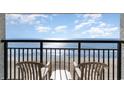 Balcony view of ocean, beach and sand on a bright sunny day at 1501 S Ocean Blvd. # 1040, Myrtle Beach, SC 29577