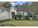 Well-maintained house with landscaped yard and front entrance at 490 Blackberry Ln., Myrtle Beach, SC 29579