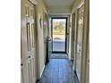 Bright entryway with tile flooring and doors leading to other rooms at 1025 Carolina Rd. # F2, Conway, SC 29526